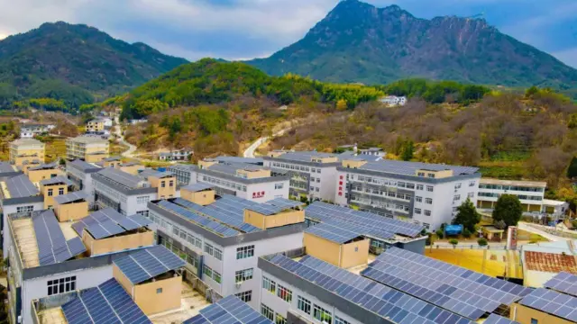 Solar panels on the roof of a factory building in Anqing city, Anhui province, China