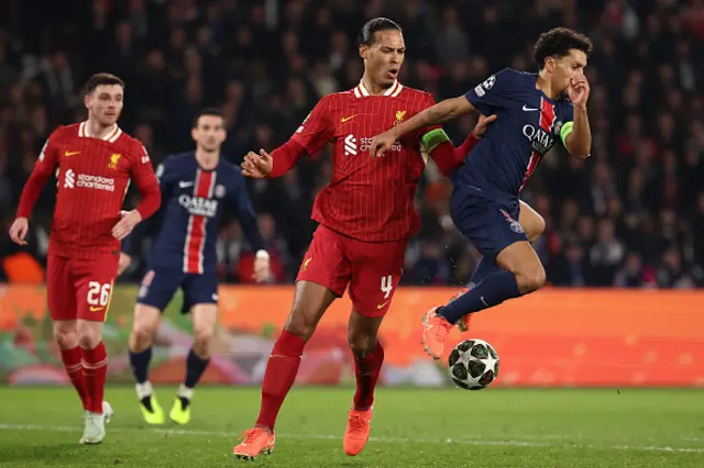 Van Dijk competes for the ball