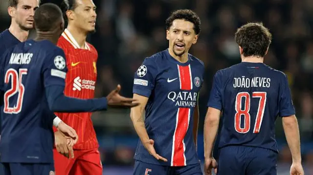 Marquinhos (C) reacts
