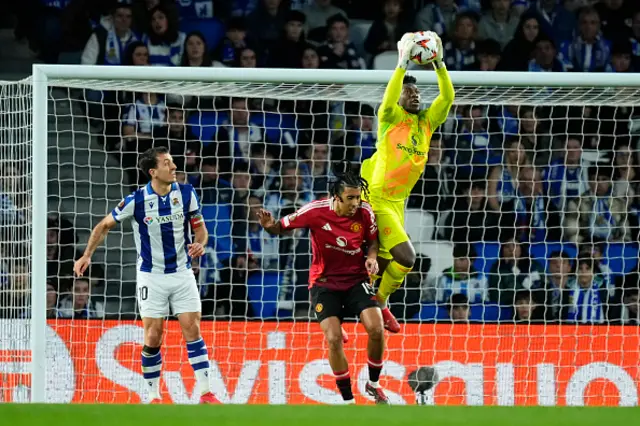 Andre Onana goalkeeper of Manchester United and Cameroon makes a save