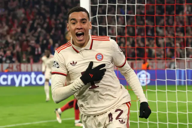Jamal Musiala celebrates after scoring against Bayer Leverkusen