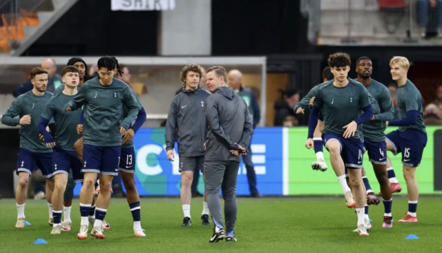 Tottenham Hotspur's Archie Gray and Son Heung-min with teammates