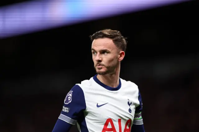 James Maddison looks on