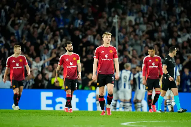 Manchester players dejected after Real Sociedad goal