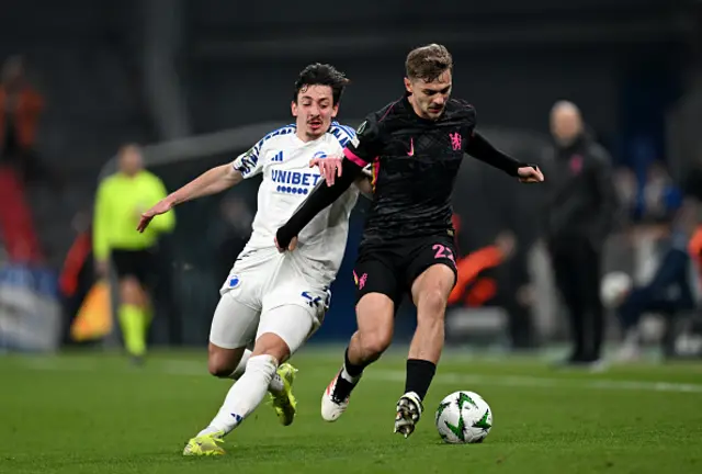 Kiernan Dewsbury-Hall of Chelsea is challenged by Giorgi Gocholeishvili