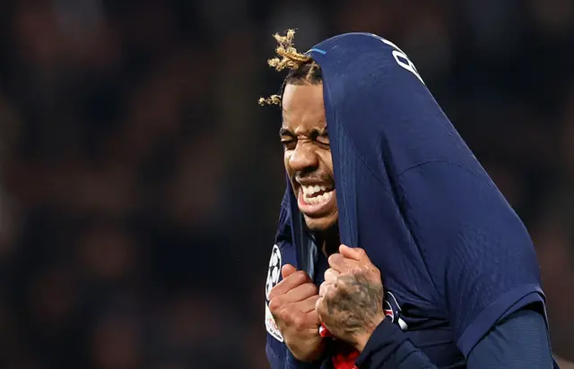 PSG's Bradley Barcola reacts after missing a chance