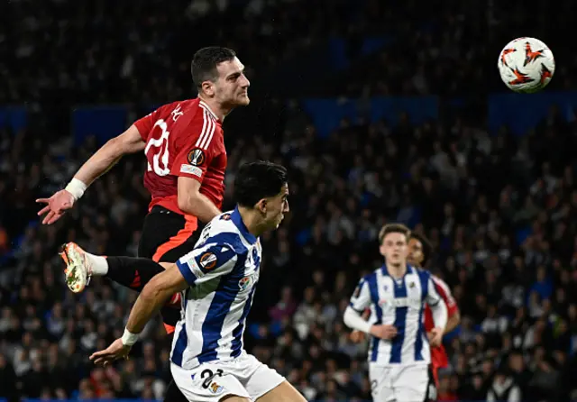 Diogo Dalot (top) goes for a header