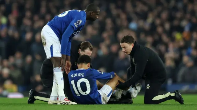 Iliman Ndiaye on the floor injured during game against Liverpool