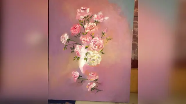 An oil painting of dainty pink roses on a pink clouded background