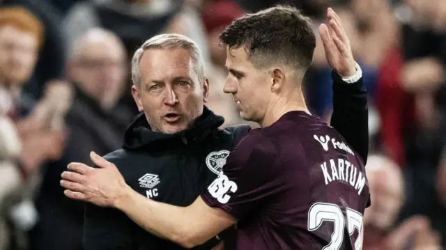 Hearts head coach Neil Critchley with Sander Kartum