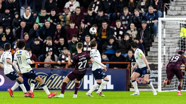 Sander Kartum scores for Hearts against Dundee