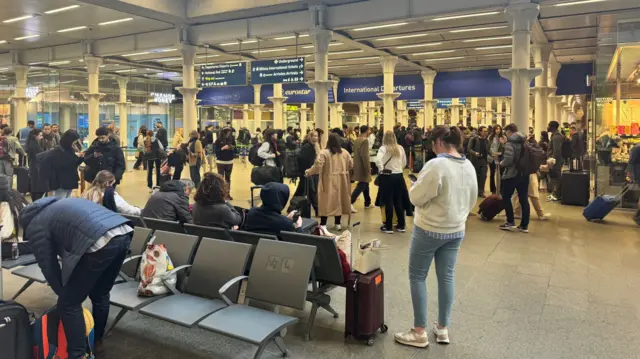 People stand around at the Eurostar terminal in London St Pancras