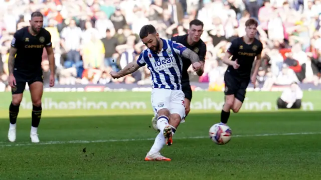 Adam Armstrong converts his penalty against QPR