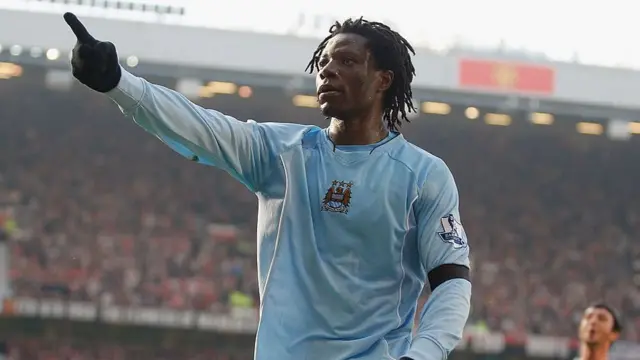 Benjani of Manchester City celebrates scoring
