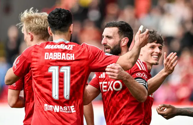 Aberdeen's Oday Dabbah and Graeme Shinnie celebrate