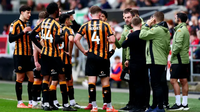 Hull manager Ruben Selles speaks to his players from the touchline