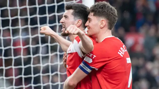 Finn Azaz celebrates after scoring