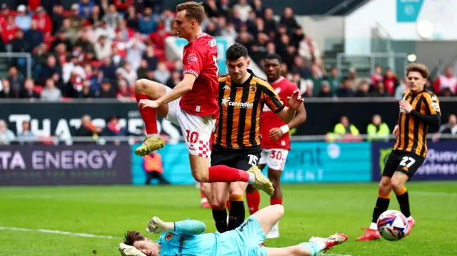 Hull goalkeeper Ivor Pandur saves from Bristol City's Scott Twine