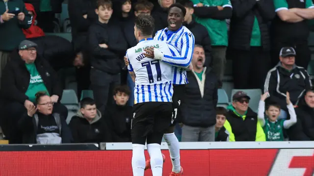 Djeidi Gassama celebrates sealing victory for Sheffield Wednesday at Plymouth