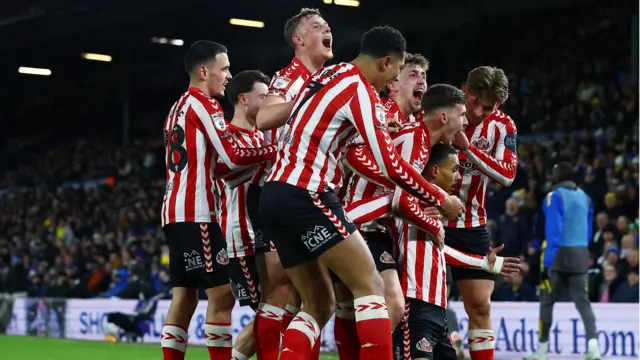 Sunderland players celebrating scoring a goal