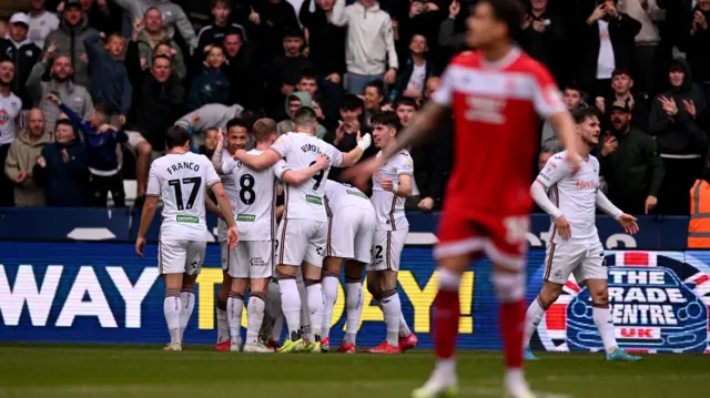 Swansea players celebrate with Eom Ji-Sung