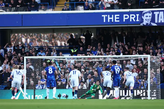 Mads Hermansen of Leicester City saves a penalty from Cole Palmer