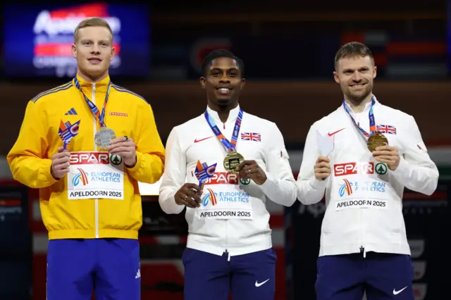 Jeremiah Azu, Henrik Larsson and Andrew Robertson on the podium