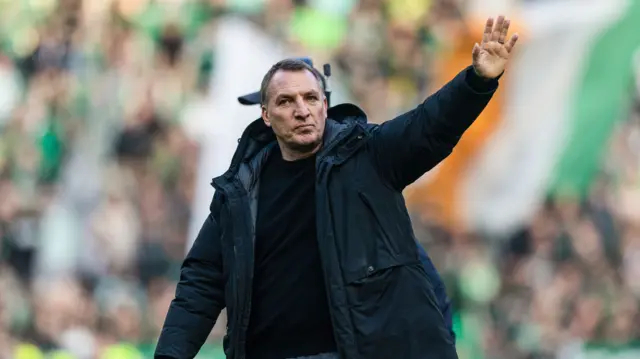 Brendan Rodgers waves to Celtic fans