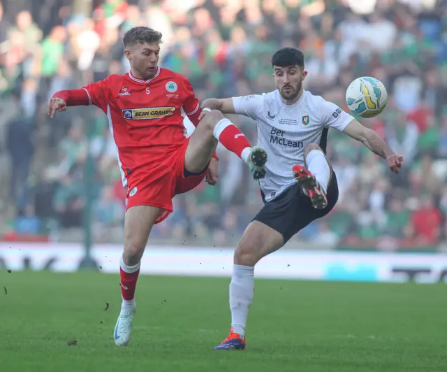 Glentoran's Daniel Amos in action against Cliftonville