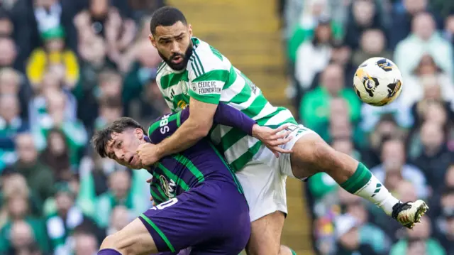 Hibernian's Kieron Bowie with Celtic's Cameron Carter-Vickers