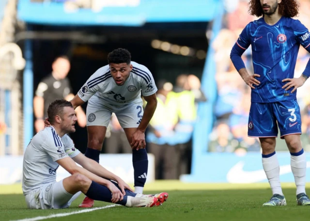 Leicester City's Jamie Vardy down injured as Chelsea's Marc Cucurella looks on