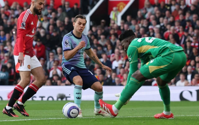 Manchester United's Andre Onana collects the ball