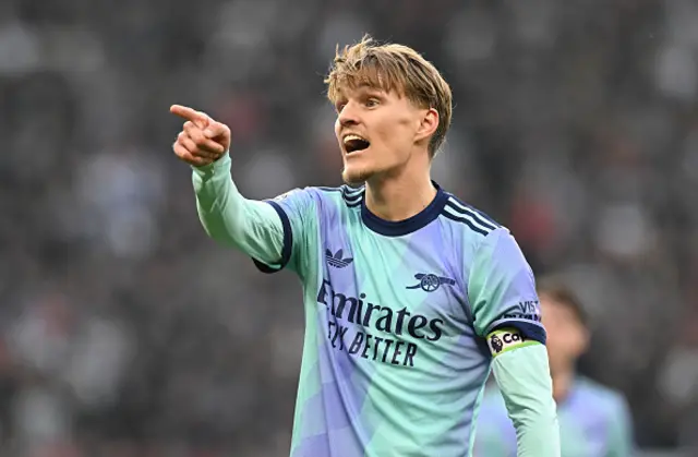 Martin Odegaard of Arsenal gives the team instructions