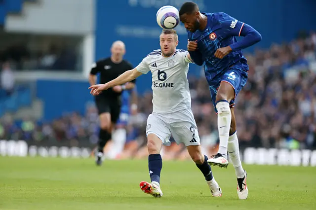 Jamie Vardy and Tosin Adarabioyo battle for the ball