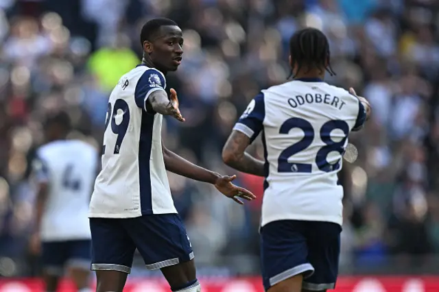 Pape Matar Sarr celebrates with Tottenham Hotspur's French midfielder Wilson Odobert