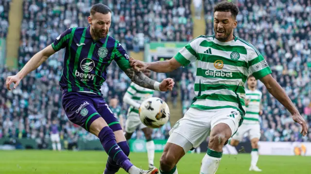 Hibernian's Martin Boyle with Celtic's Auston Trusty