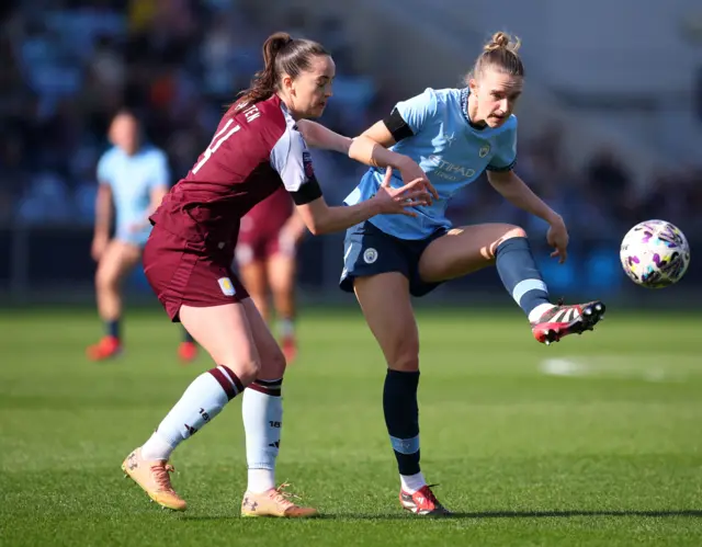 Aston Villa's Anna Patten in action with Manchester City's Vivianne Miedema