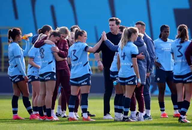 Manchester City manager Gareth Taylor and players celebrate after the match