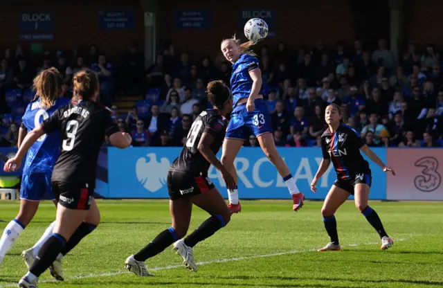 Chelsea's Aggie Beever-Jones heads at goal during the Adobe Women's FA Cup quarter-final match at Kingsmeadow, London