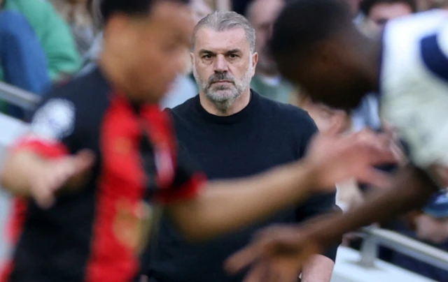 Tottenham Hotspur manager Ange Postecoglou looks on