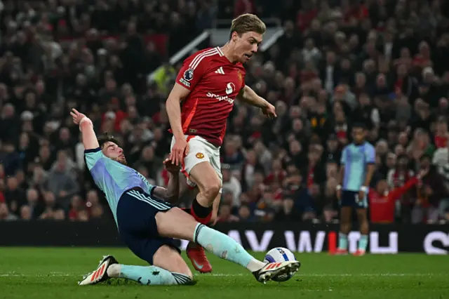 Declan Rice (L) makes a last-ditch tackle