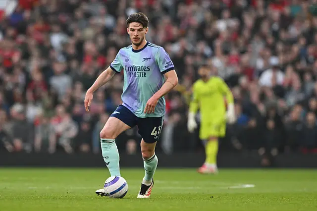 Declan Rice of Arsenal runs with the ball