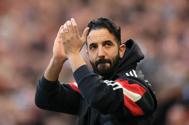 Ruben Amorim, Manager of Manchester United, acknowledges the fans