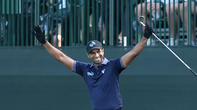 Aaron Rai celebrates