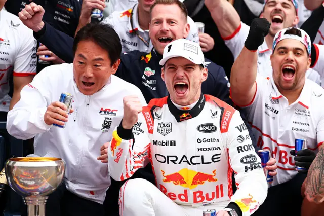 Max Verstappen celebrates his win at the Japanese Grand Prix