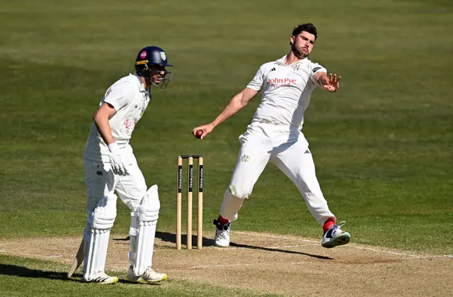 Josh Tongue bowling for Notts