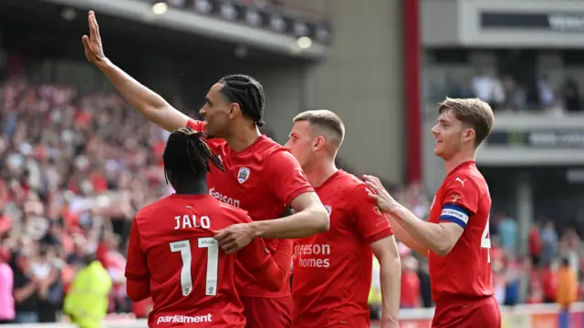 Jon Russell celebrates scoring for Barnsley