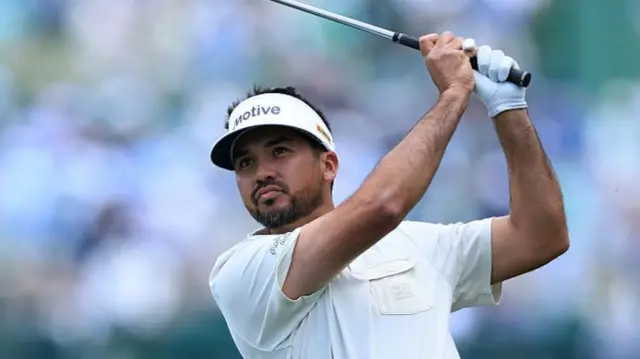 Jason Day hits a drive