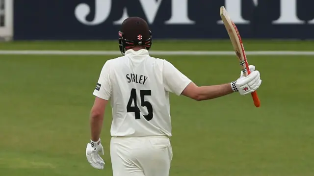 Dom Sibley celebrates