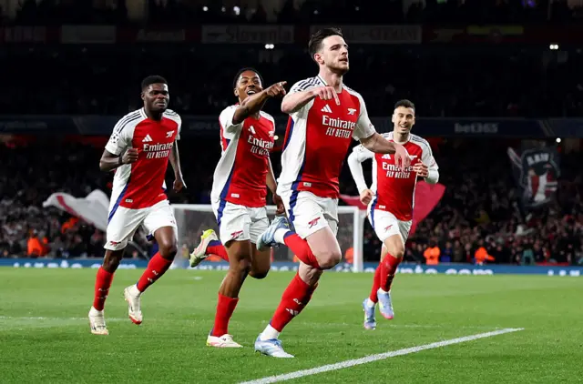 Declan Rice of Arsenal celebrates after scoring to make it 1-0 against Real Madrid